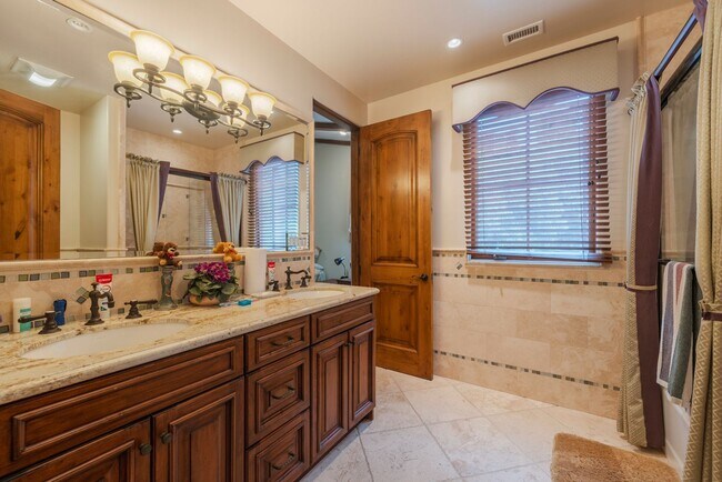 Building Photo - Gorgeous 5 Bedroom Home with sweeping view...