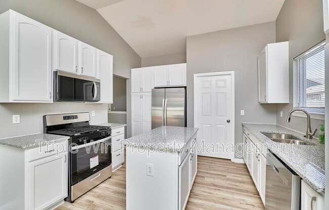 Building Photo - 4927 Triple Tree Ct