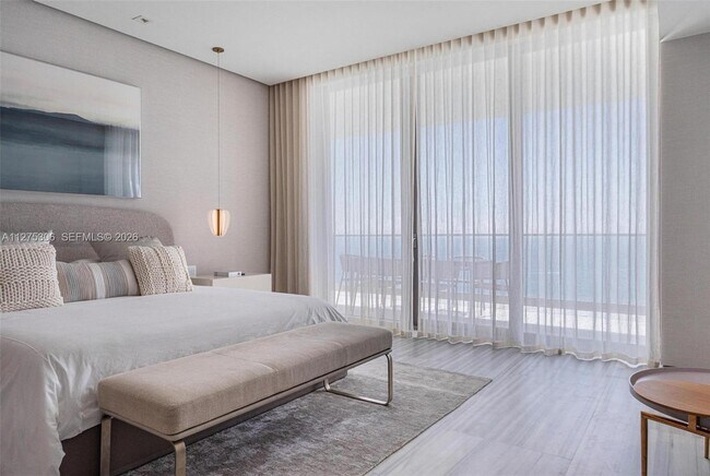 Building Photo - 18975 Collins Ave