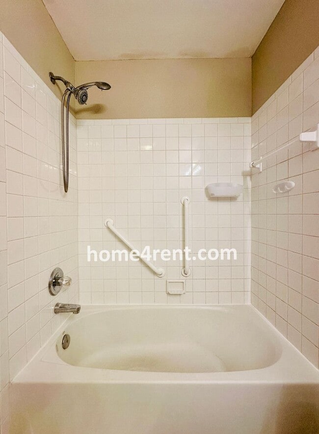Building Photo - Maintenance FREE, Ranch Style Townhome w/ ...