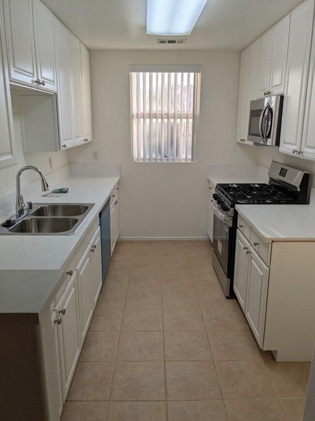 Building Photo - 10201 Remmet Ave