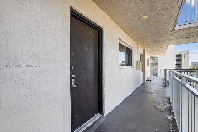 Building Photo - 9915 W Okeechobee Rd