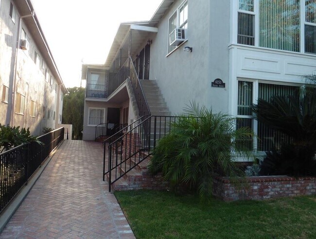 Brick Courtyard in Front of Unit - 6253 Friends Ave