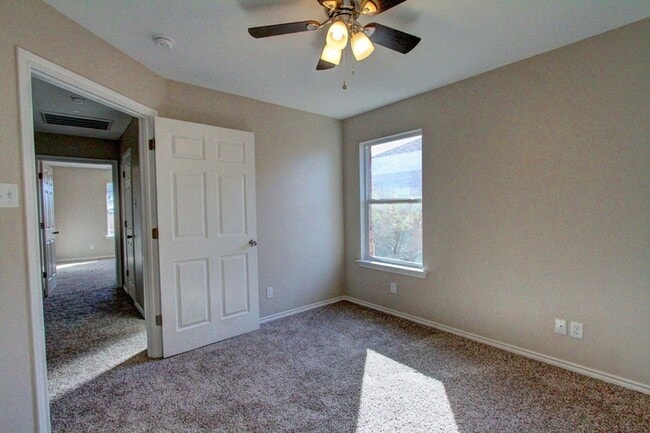 Building Photo - COMING SOON - 4 Bedroom Home + 2 Car Garage and Privacy Fenced Backyard!