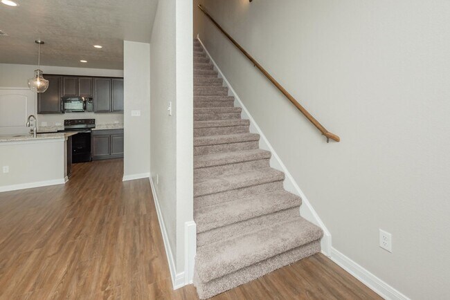 Building Photo - Live, love, and grow in this charming townhome!