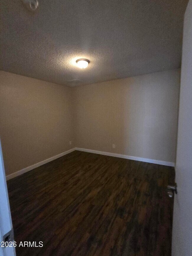 Building Photo - 9002 W Roma Ave