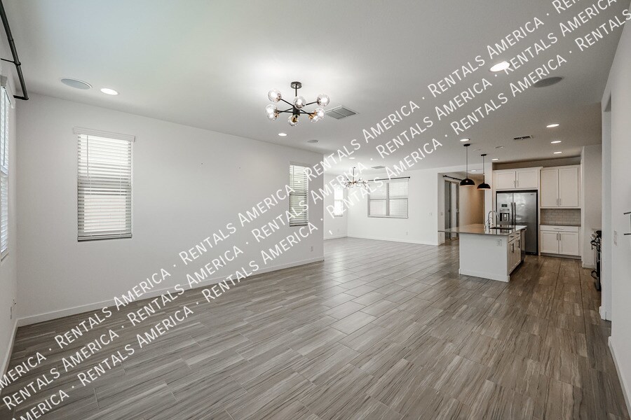 Building Photo - 12380 W Wagon Wheel Dr