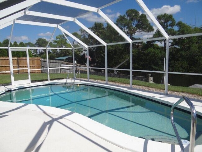 Building Photo - AVAILABLE SEASON 2027   PORT CHARLOTTE, HEATED POOL HOME, SALT WATER CANAL   $3900