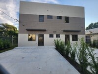Building Photo - Elegworld 6233 NW 20 Ave