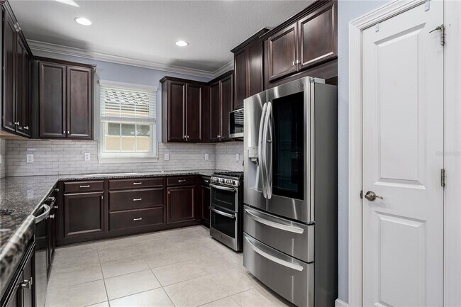 Building Photo - 10413 Highland Park Pl