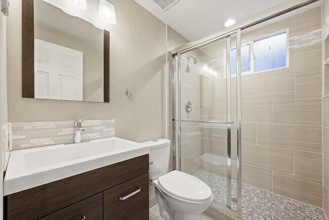 Building Photo - Spacious 4BR Home with Finished Basement, Private Yard & Community Amenities