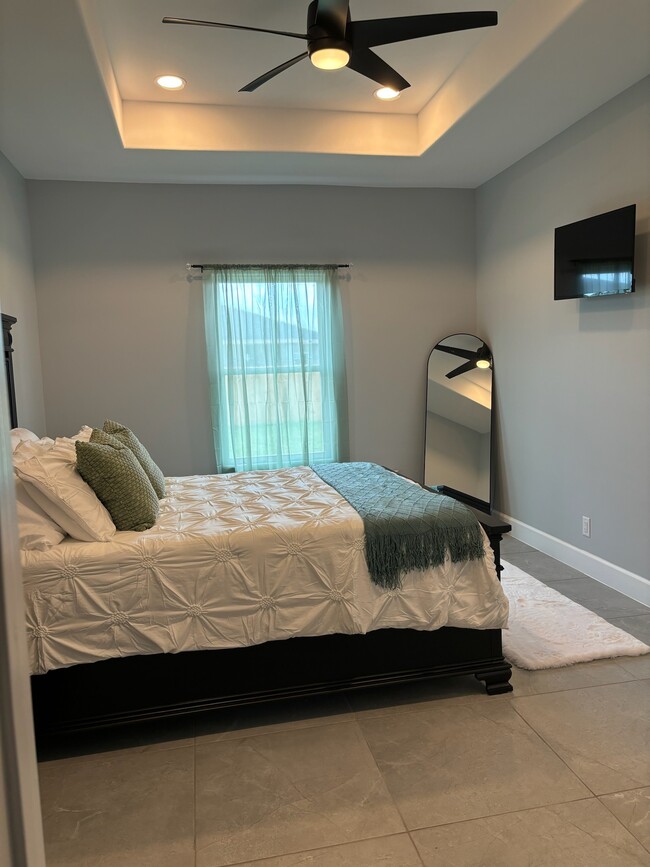 1. Master Bedroom – Spacious Retreat with En-Suite Bath - 1205 Central Blvd