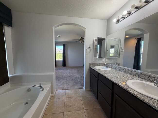 Building Photo - 4 BED 2.5 BATH 2 CAR GARAGE SINGLE FAMILY HOME W/ FULLY LANDSCAPED BACKYARD. THIS WAS FORMER MODE...