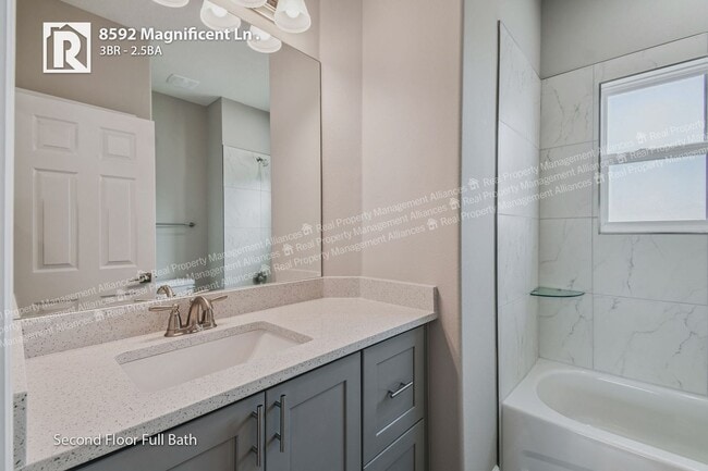 Building Photo - Modern Corner Townhome where Comfort Meets...