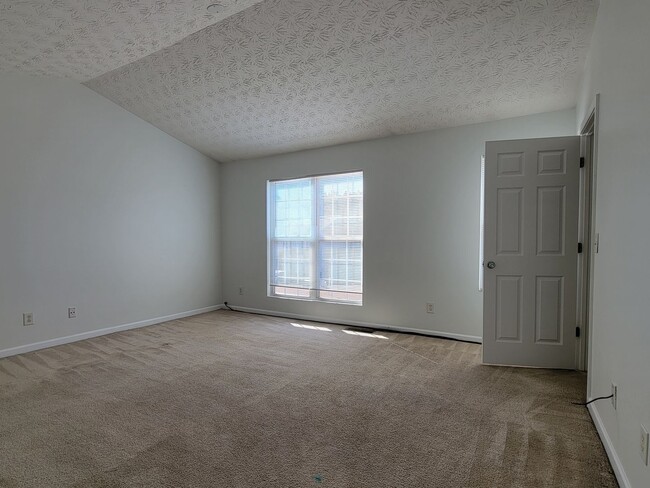 Building Photo - Experience modern living in this stunning two-story townhome! Awesome School District