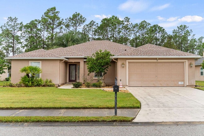 Building Photo - Luxurious Palm Coast Retreat: 4-Bed 3 Bath...