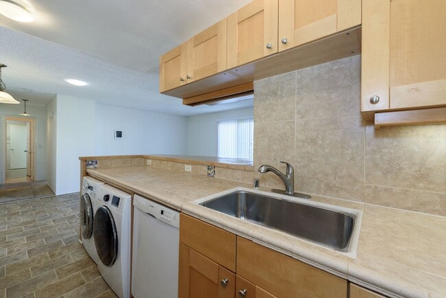 Building Photo - Serenity Abounds in University City!