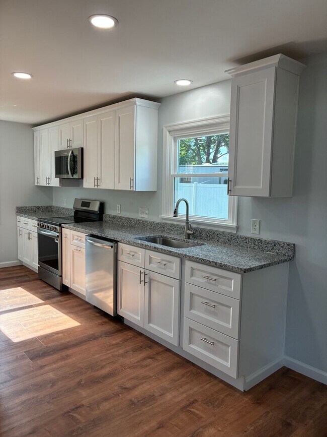 Building Photo - Two Full Living Areas — One Incredible Hom...