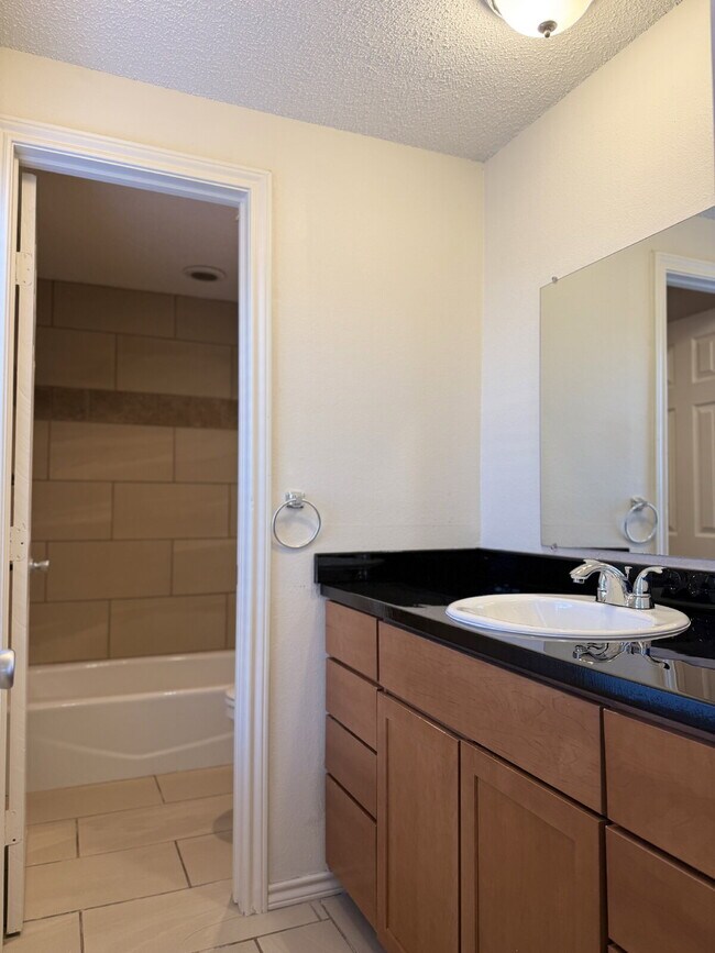 Building Photo - Modern Elegance Meets Location: High Ceilings, Updated Fixtures, Move-In Ready!