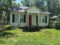 Building Photo - Welcome to this charming 2-bedroom, 1-bath...