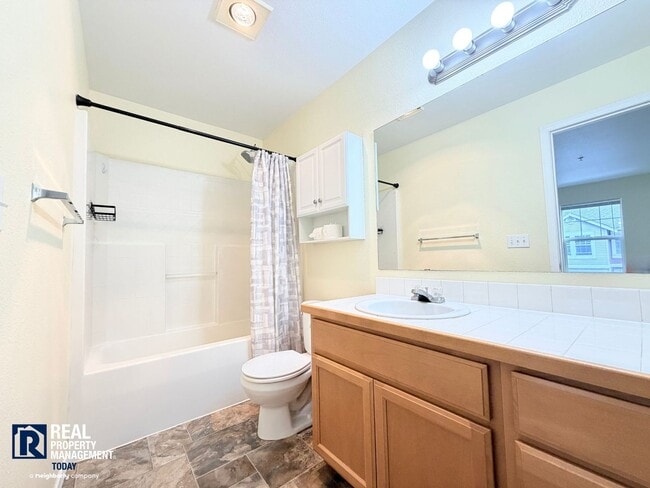 Building Photo - Spacious 4-Bedroom Townhome in Alicia Meadows | Garage, Patio & Pet Friendly