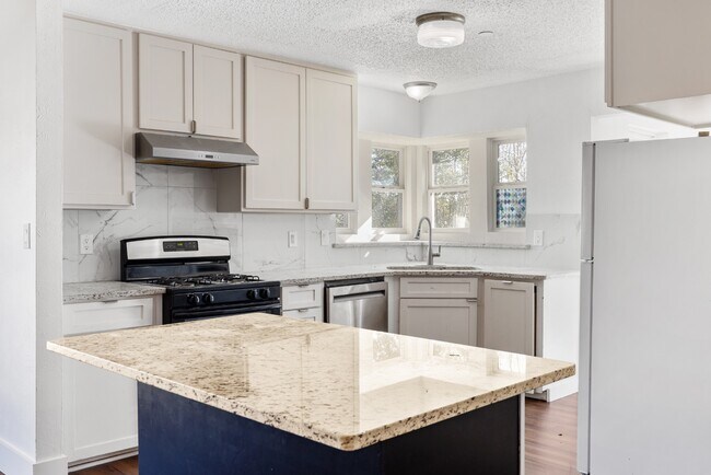 Building Photo - Updated in Garland