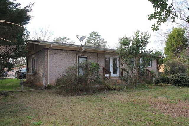 Building Photo - Welcome to this beautiful brick home nestl...