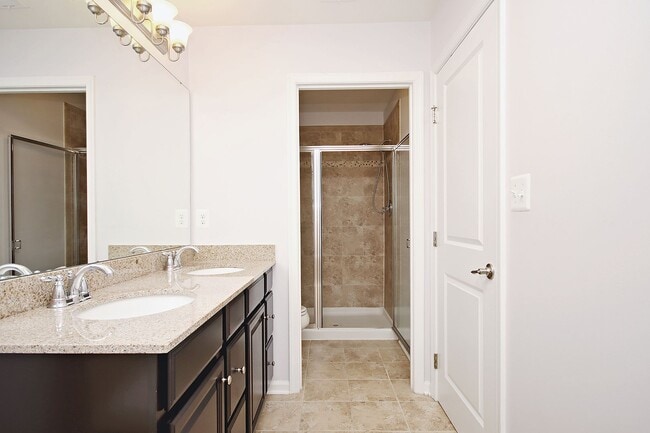 Building Photo - Pet-Friendly Townhome Minutes From NGIC, C...