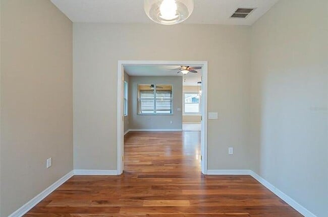 Building Photo - Spacious 3/2 with enclosed office and fence enclosed yard!