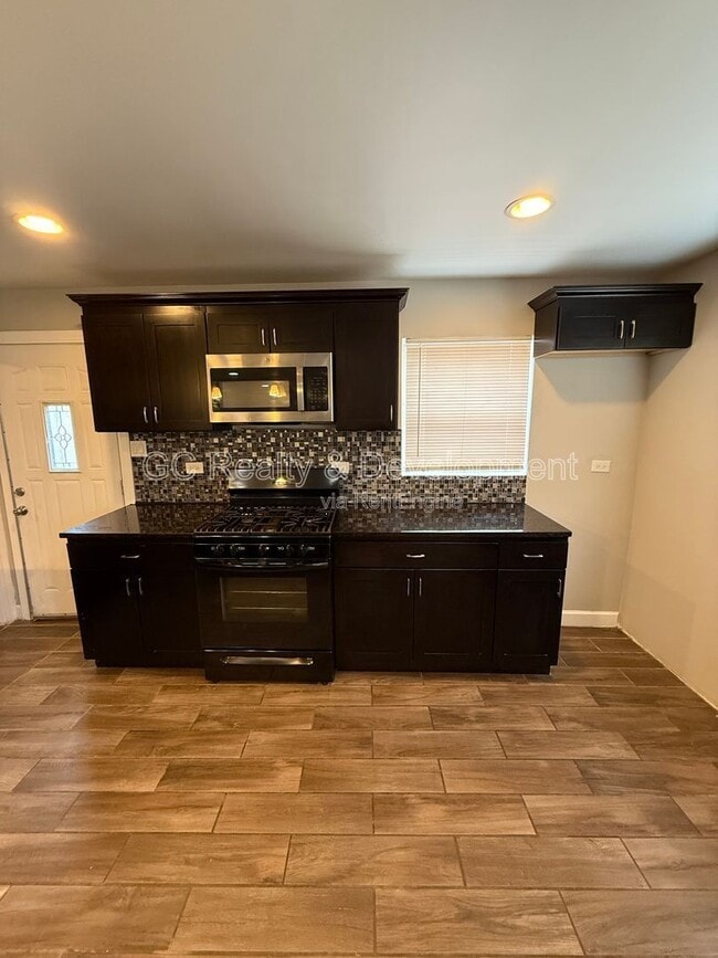 Building Photo - 9110 S Essex Ave