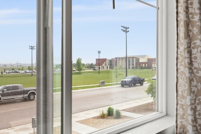 Building Photo - Beautiful 3-Bedroom Townhome with Park Views- Available July 25th!