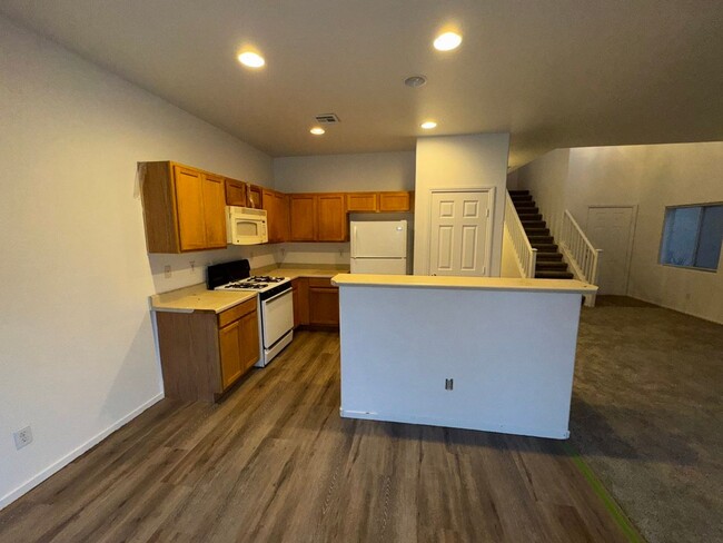 Building Photo - Fresh Paint/New Flooring all inside! Four ...