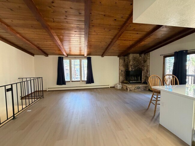 Building Photo - 2 Bed + Huge Bonus Room -  new flooring, paint and kitchen!   Lake Village Condo w/Forest Views