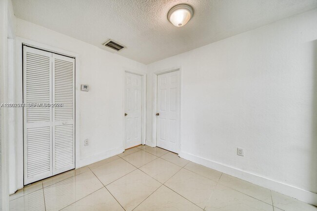 Building Photo - 1200 NW 102nd St