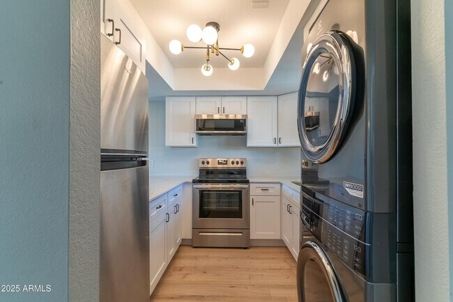 Building Photo - Amazing Condo is now available in heart of...