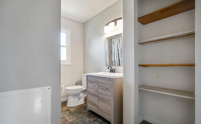 Building Photo - Welcome home to this updated bright and sp...