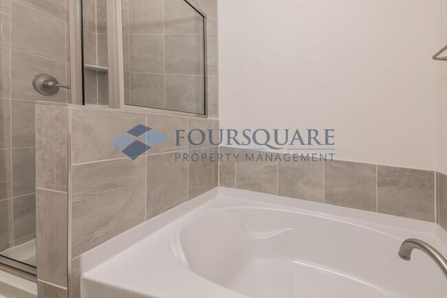 Building Photo - End Unit Townhome | Back Patio with Privac...