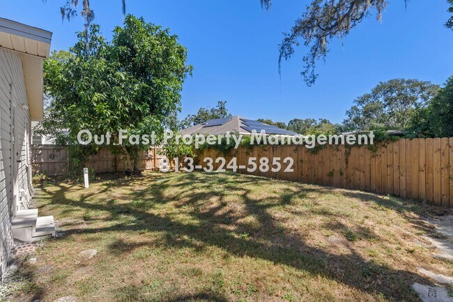 Building Photo - Private Yard Living with Recent Upgrades in Central Tampa