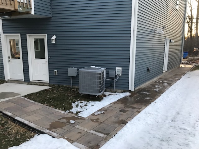 Paver walkway from the driveway to the main apartment door (on the right). - 2225 Middleton Beach Rd