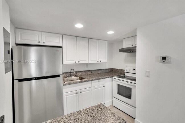 Building Photo - 4335 NW S Tamiami Canal Dr