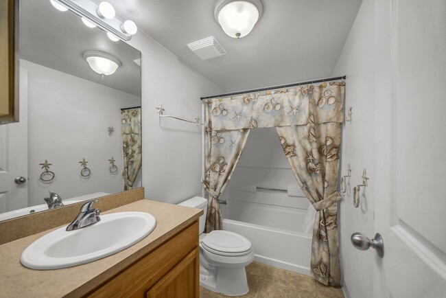 Building Photo - Move-In Ready 2BR/2BA Condo – Fully Furnished, AC, Washer/Dryer, 2 Parking stalls