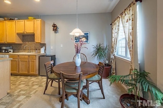 eating area with view of patio and wooded backyard - 245 Plaza Dr