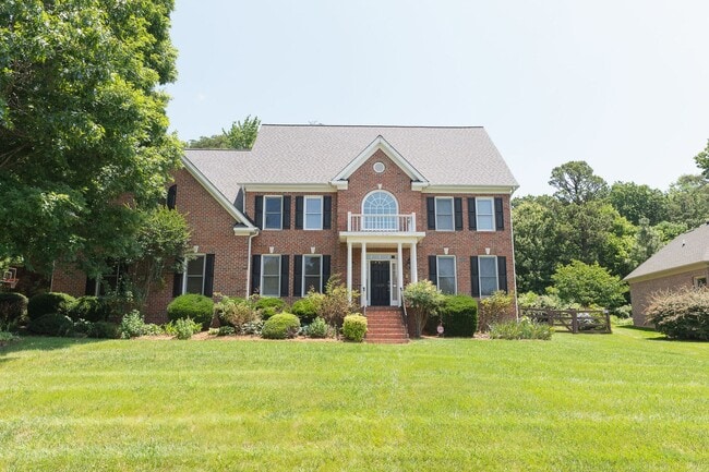 Building Photo - Spacious & Striking 3-story brick Executive 4 bedroom 4.5 bathroom home in Oak Ridge NC + Lawn ca...