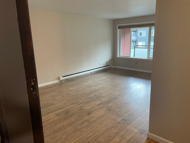 Facing living area after entering front entry. - 7001 Sand Point Way NE