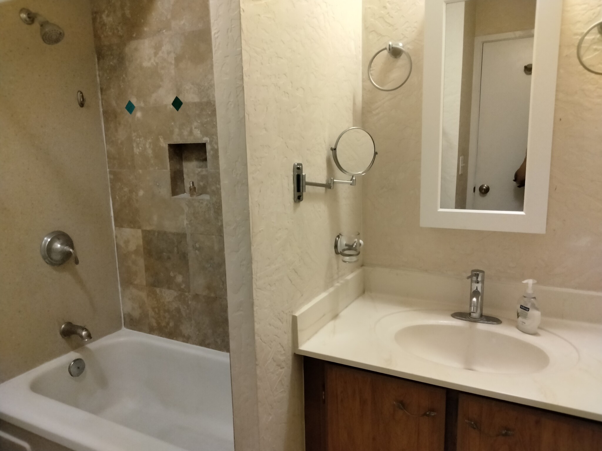 Full Bath with Travertine tile located in hallway - 1571 Piikoi St