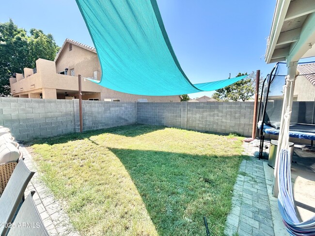 Building Photo - 7407 E Medina Ave