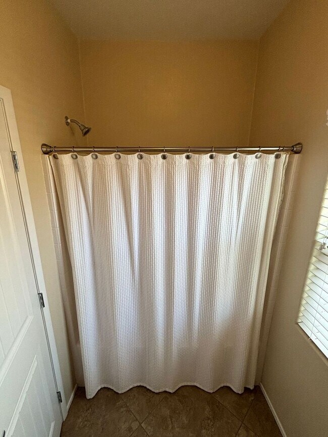 Building Photo - Gated 3-Bedroom Home with Community Pool Near Fort Apache & Blue Diamond