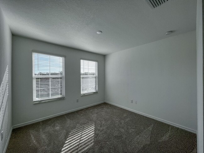 Building Photo - Townhome with garage, excellent location, community pool and more