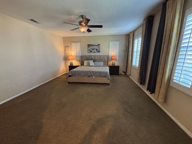 Building Photo - Short Term Lease - Grand 4-Bedroom Home with Entertainer's Yard in Gated River Village!