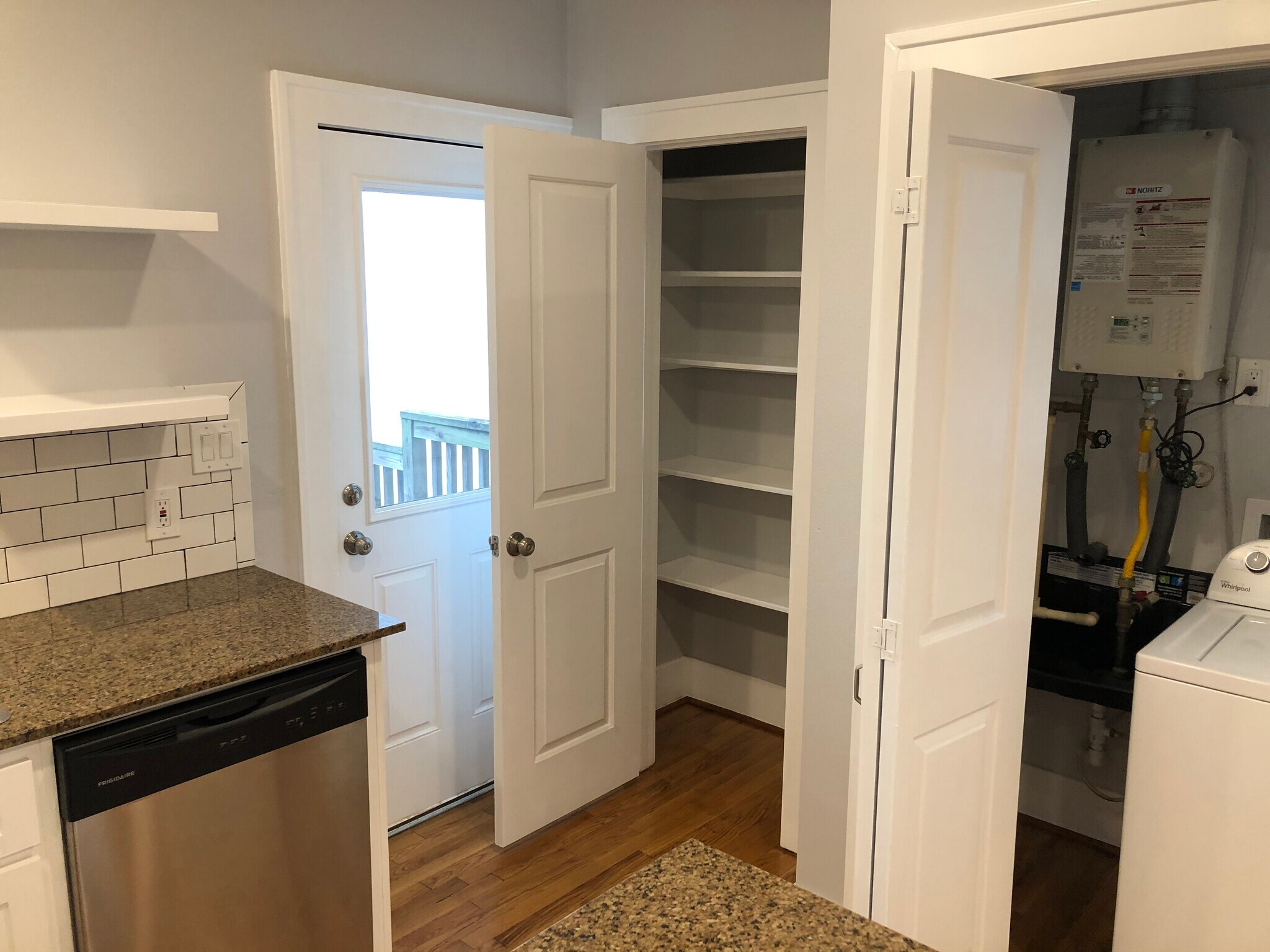 Large pantry storage and back door access to gated backyard and garage - 1712 Blodgett St